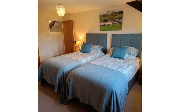 2nd Bedroom with luxurious Zip and Link Beds that configure to two full size Single Beds or one large Super-King Bed